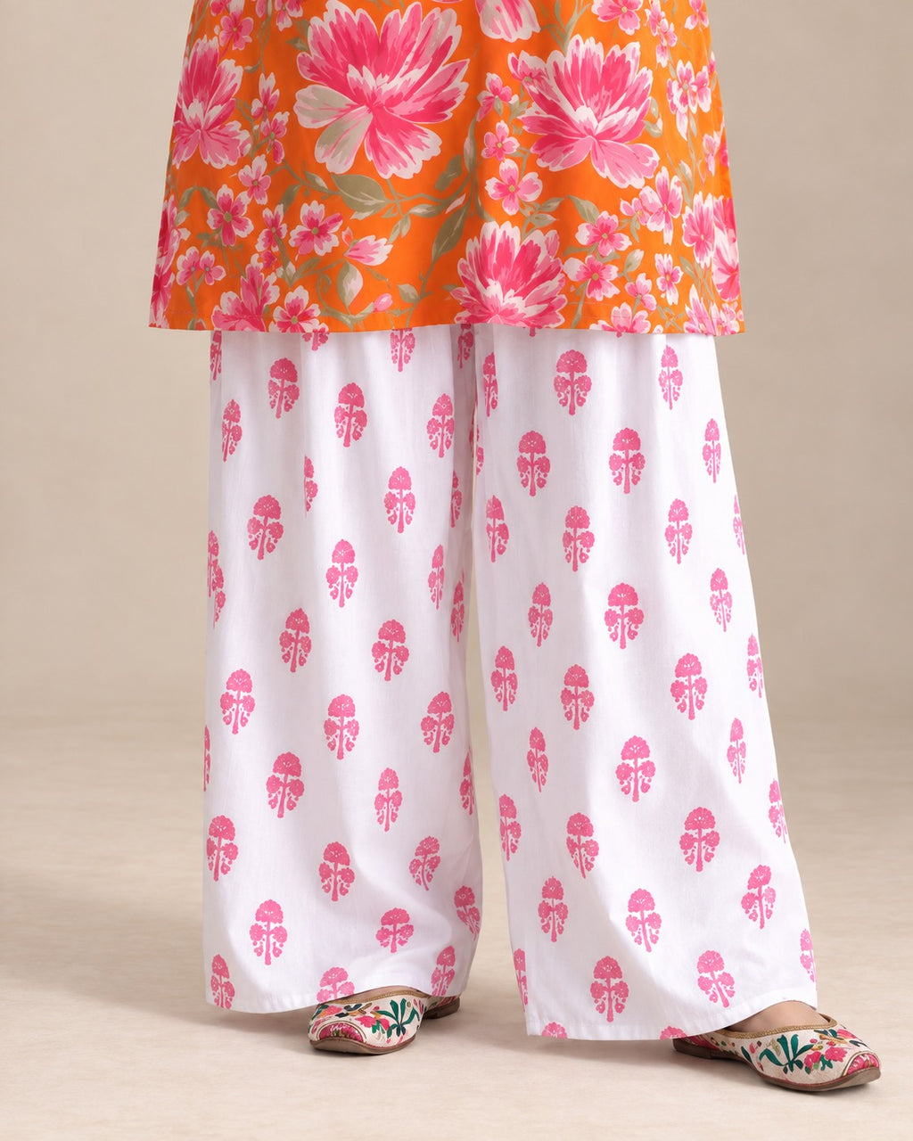 Tangerine Bloom Orange Floral Kurta & White Palazzo Set